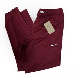 Nike women’s warm up pants new with tags size L